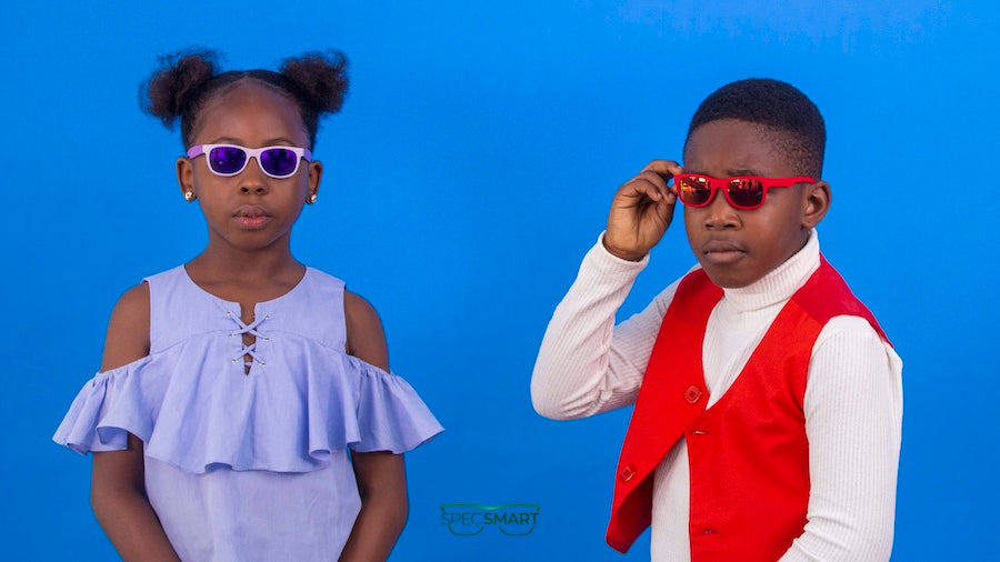 Girl and Boy Wearing Sunglasses | SpecSMART Eye Clinic Ikeja