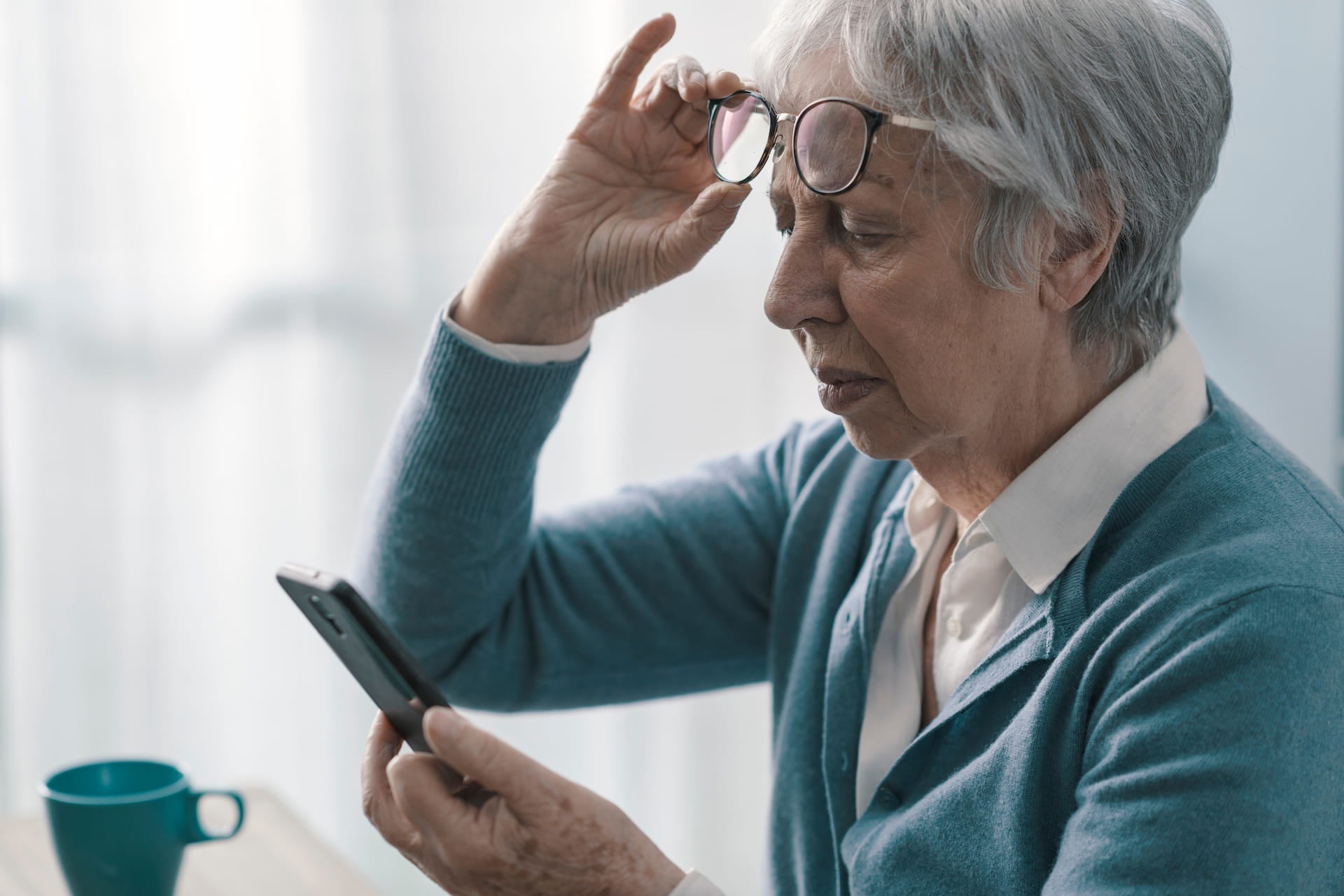 Elderly woman wearing eyeglasses