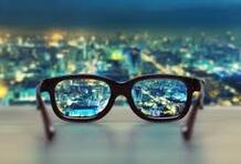 blurry city view through eyeglasses| SpecSMART Eye Clinic Ikeja