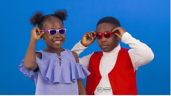 Children wearing protective sunglasses