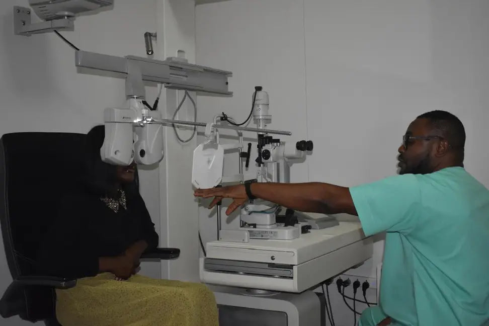 A patient undergoing an eye test with our Optometrist| SpecSMART Eye Clinic Ikeja