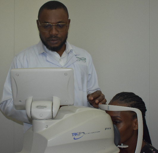 Optometrist with patient