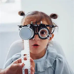 A child undergoing an eye test| SpecSMART Eye Clinic Ikeja