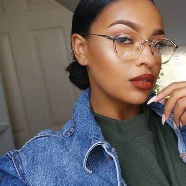 A pretty woman wearing a designer frame| SpecSMART Eye Clinic Ikoyi