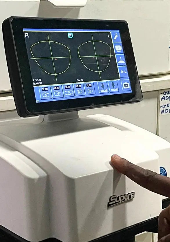 An Optician glazing customized lens for a patients| SpecSMART Eye Clinic Ikoyi
