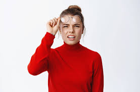 A woman wearing a wrong prescription glasses| SpecSMART Eye Clinic Ikeja