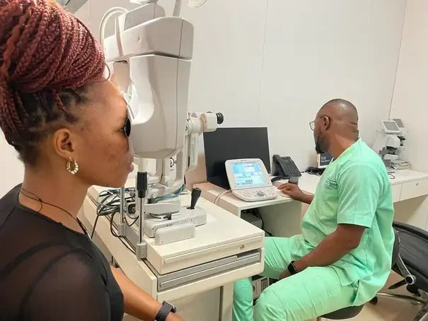 Optometrists and a patient undergoing an Eye test| SpecSMART Eye Clinic Ikeja