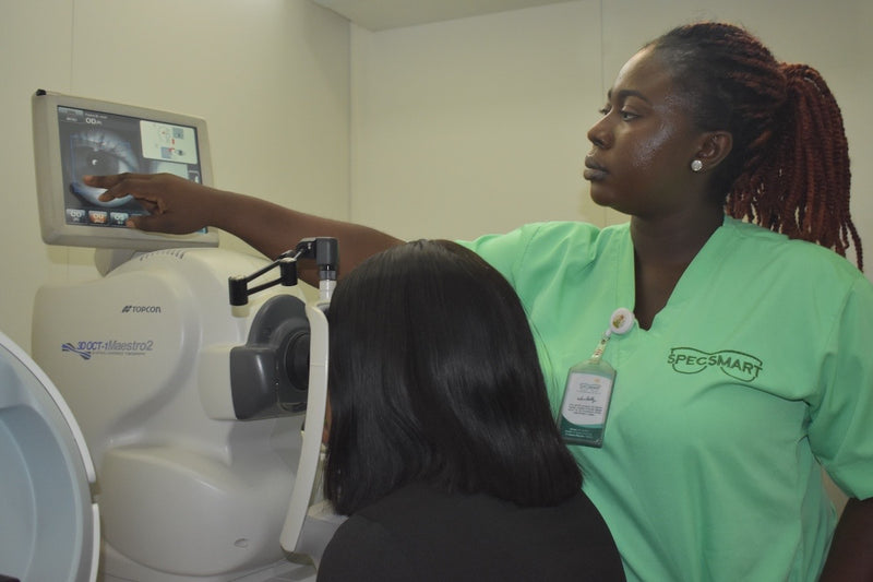 Ikoyi Optometrist performing OCT scan 