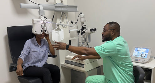SpecSMART Eye Clinic Ikeja Optometrist 
Doing refraction test with female
patient