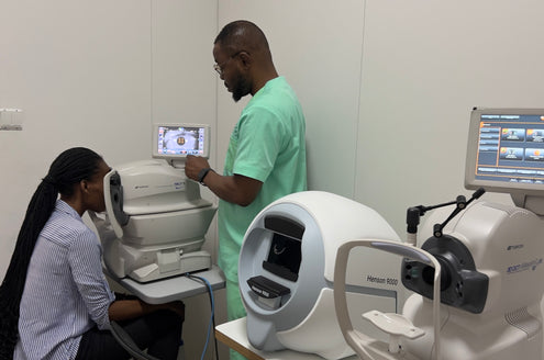 SpecSMART Eye Clinic Ikeja ,Eye Doctor
Doing tonometer test with female
patient